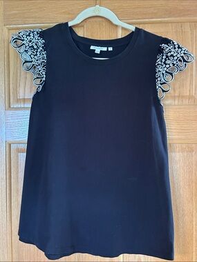 Chico's Black Tank with White Embroidered Flutter Sleeves. Size Chico’s 2.